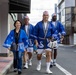 Coming Together - U.S. service members with Marine Corps Air Station Iwakuni participate in Iwakuni Matsuri Festival and Parade