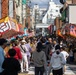 Coming Together - U.S. service members with Marine Corps Air Station Iwakuni participate in Iwakuni Matsuri Festival and Parade