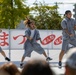 Coming Together - U.S. service members with Marine Corps Air Station Iwakuni participate in Iwakuni Matsuri Festival and Parade