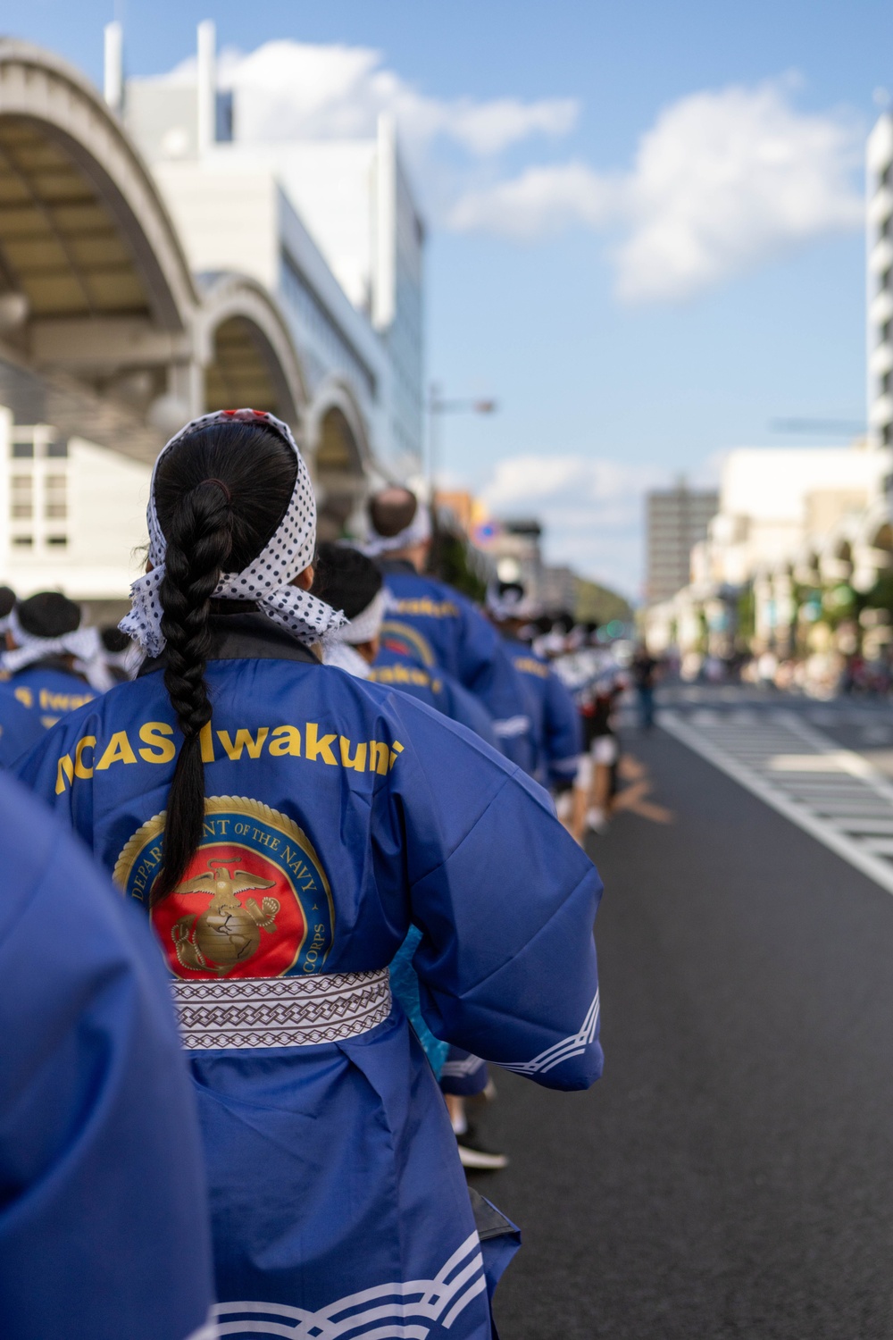 Coming Together - U.S. service members with Marine Corps Air Station Iwakuni participate in Iwakuni Matsuri Festival and Parade