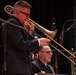 Musician 1st Class David Kapral performs a solo at James Benson Dudley High School