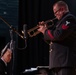 Musician 1st Class Thomas Eby performs a solo at James Benson Dudley High School