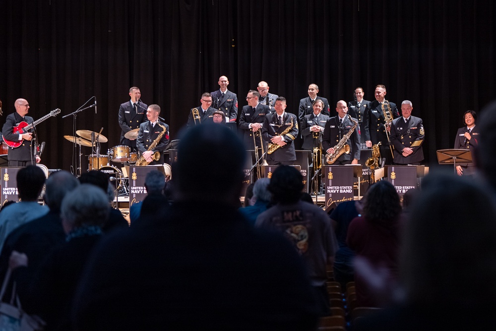 The U.S. Navy Band Commodores receive a standing ovation at James Benson Dudley High School during the 2023 National Tour