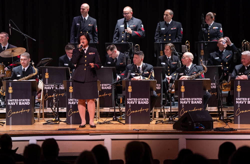 The U.S. Navy Band Commodores performs at James Benson Dudley High School during the 2023 National Tour