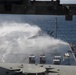 USS Abraham Lincoln conducts a countermeasure washdown