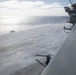 USS Abraham Lincoln conducts a countermeasure washdown