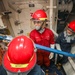 Sailors onboard USS Shoup participate in flooding drill