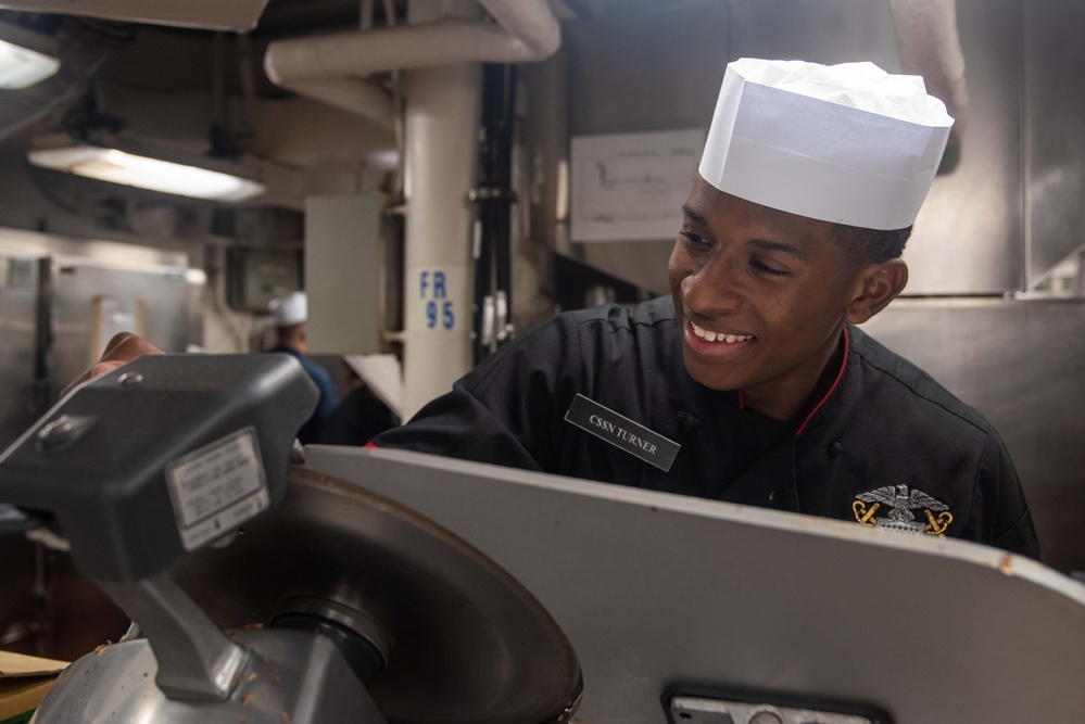 USS Ronald Reagan (CVN 76) Sailors prepare food in the galley