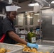 USS Ronald Reagan (CVN 76) Sailors prepare food in the galley