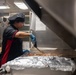 USS Ronald Reagan (CVN 76) Sailors prepare food in the galley