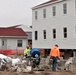 Work to build new foundations for relocated World War II-era barracks continues at Fort McCoy