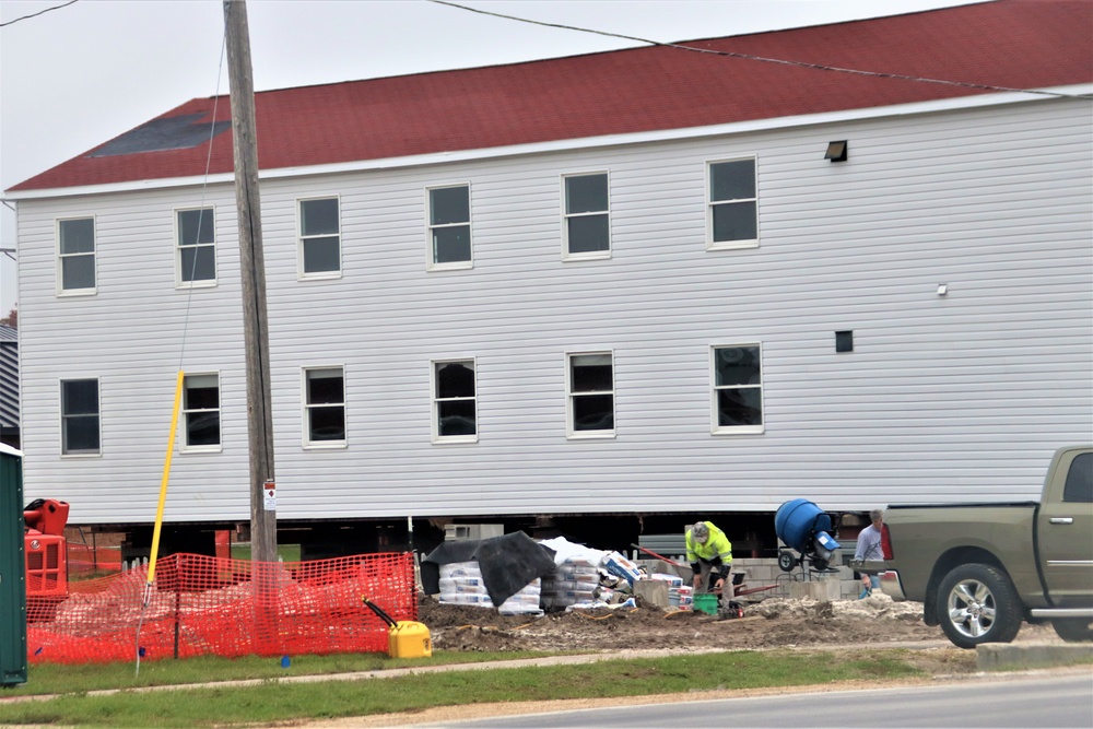 Work to build new foundations for relocated World War II-era barracks continues at Fort McCoy