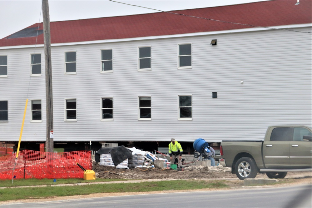 Work to build new foundations for relocated World War II-era barracks continues at Fort McCoy