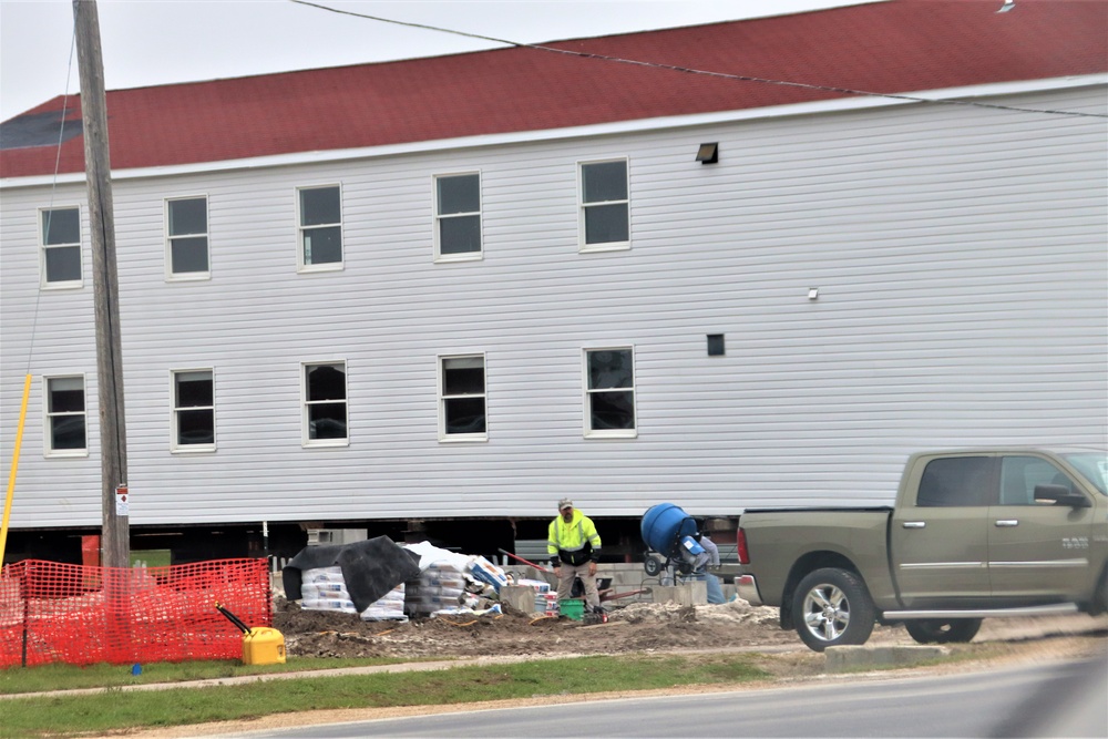 Work to build new foundations for relocated World War II-era barracks continues at Fort McCoy