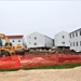 Work to build new foundations for relocated World War II-era barracks continues at Fort McCoy