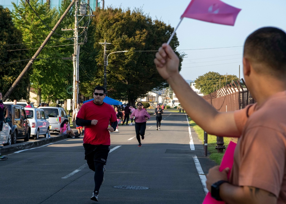 Team Yokota holds a 5K run against breast cancer