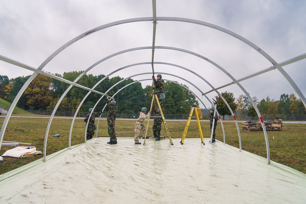 110th FFS assemble tents for readiness exercise