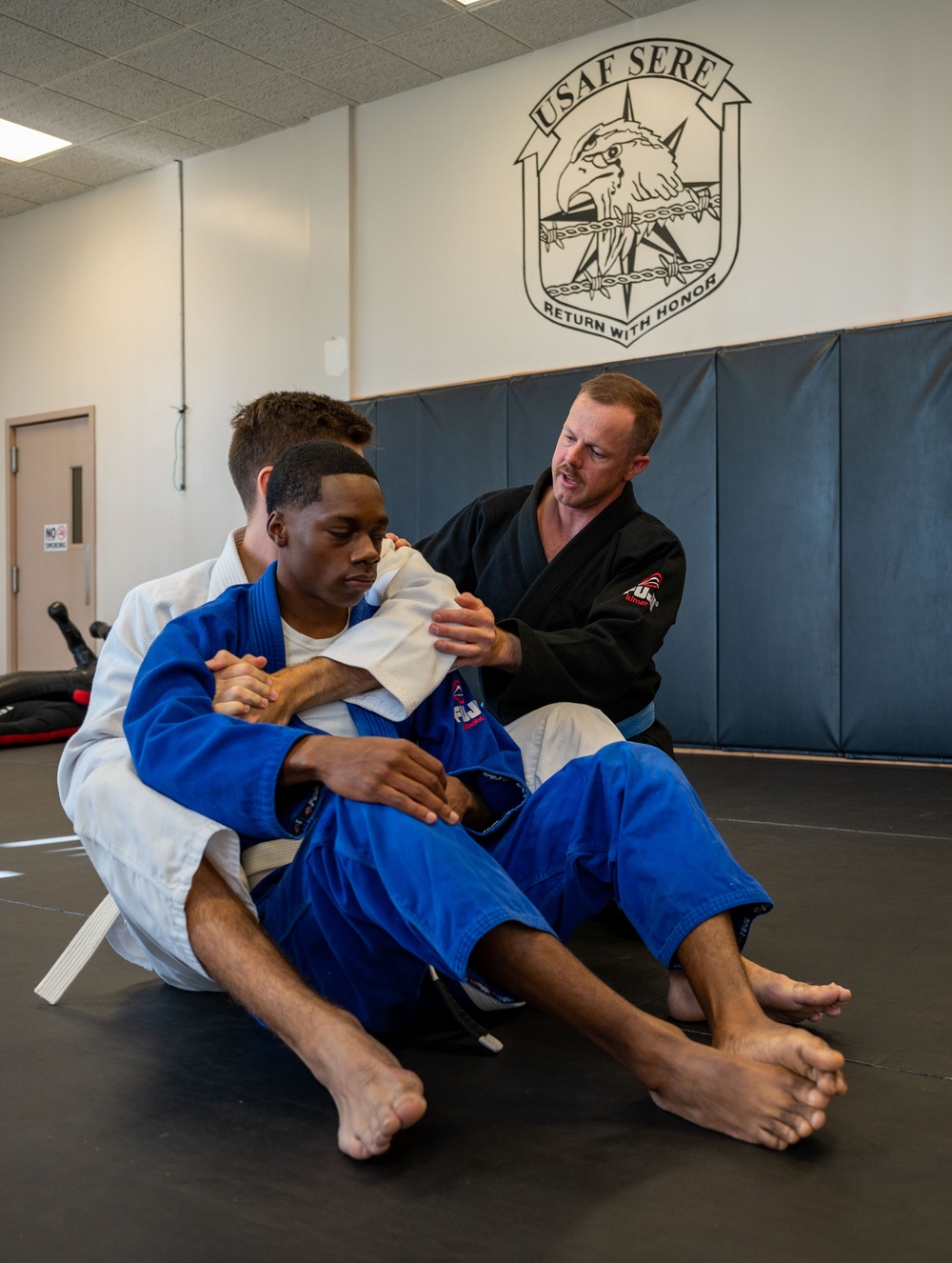 Conducting open mat combatives training