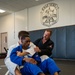 Conducting open mat combatives training