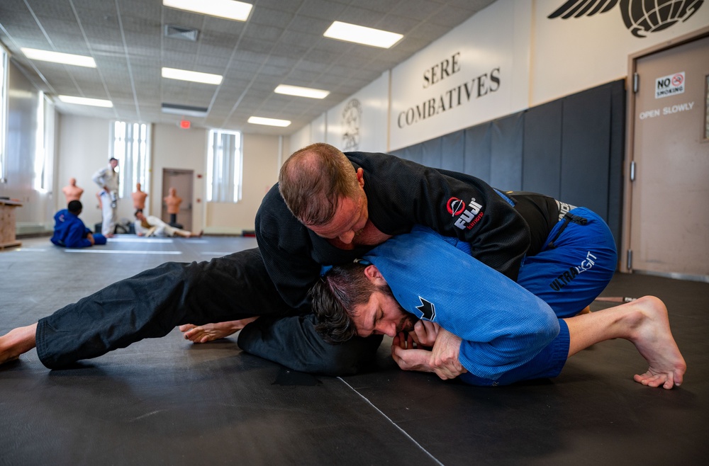 Conducting open mat combatives training