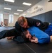 Conducting open mat combatives training