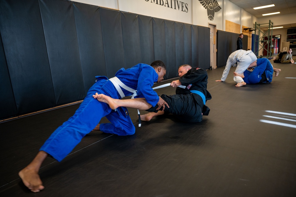 Conducting open mat combatives training