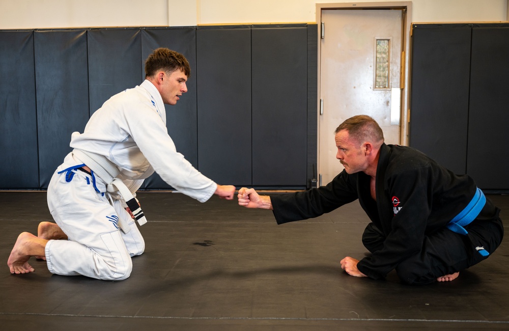 Conducting open mat combatives training