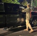 The 10th Mountain Division Sustainment Brigade help distribute water outside of the Watertown Municipal Arena to residents of Watertown, New York.