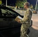 The 10th Mountain Division Sustainment Brigade help distribute water outside of the Watertown Municipal Arena to residents of Watertown, New York.