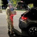 The 10th Mountain Division Sustainment Brigade help distribute water outside of the Watertown Municipal Arena to residents of Watertown, New York.