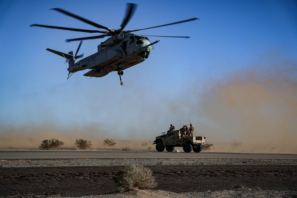 Helicopters perform an external lift