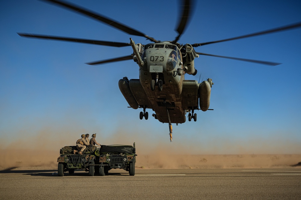 Helicopters perform an external lift