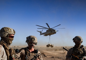 Helicopters perform an external lift