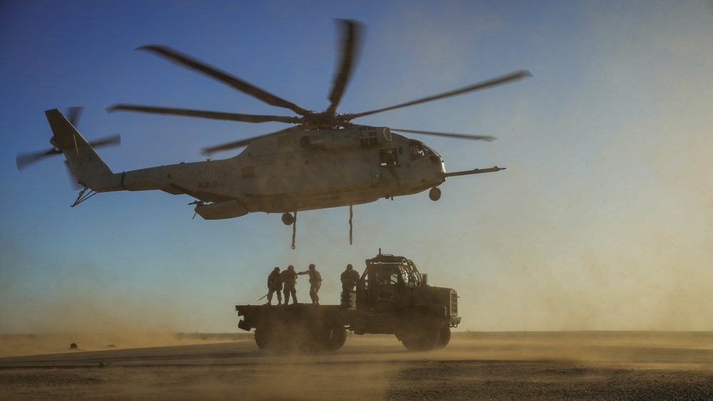 Helicopters perform an external lift