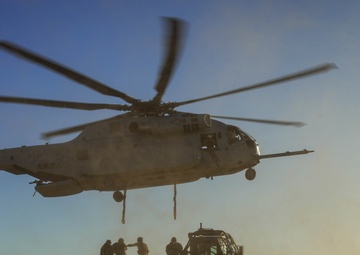 Helicopters perform an external lift