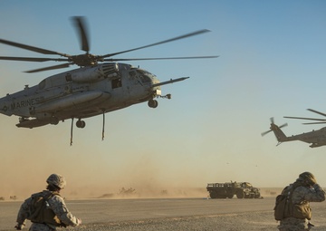 Helicopters perform an external lift