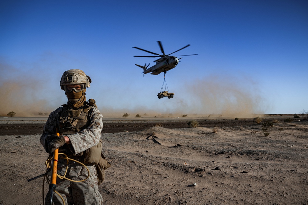 Helicopters perform an external lift