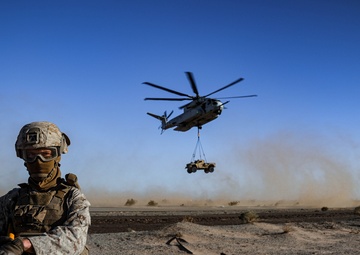 Helicopters perform an external lift