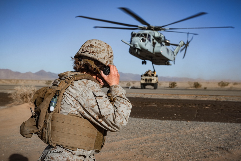 Helicopters perform an external lift