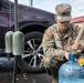 The 10th Mountain Division Sustainment Brigade 548th Combat Sustainment Support Battalion help distribute water outside of the Watertown Municipal Arena to residents of Watertown, New York.