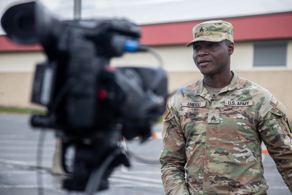 The 10th Mountain Division Sustainment Brigade 548th Combat Sustainment Support Battalion help distribute water outside of the Watertown Municipal Arena to residents of Watertown, New York.