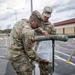 The 10th Mountain Division Sustainment Brigade 548th Combat Sustainment Support Battalion help distribute water outside of the Watertown Municipal Arena to residents of Watertown, New York.