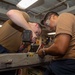 USS Ronald Reagan (CVN 76) Sailors perform maintenance