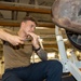 USS Ronald Reagan (CVN 76) Sailors perform maintenance