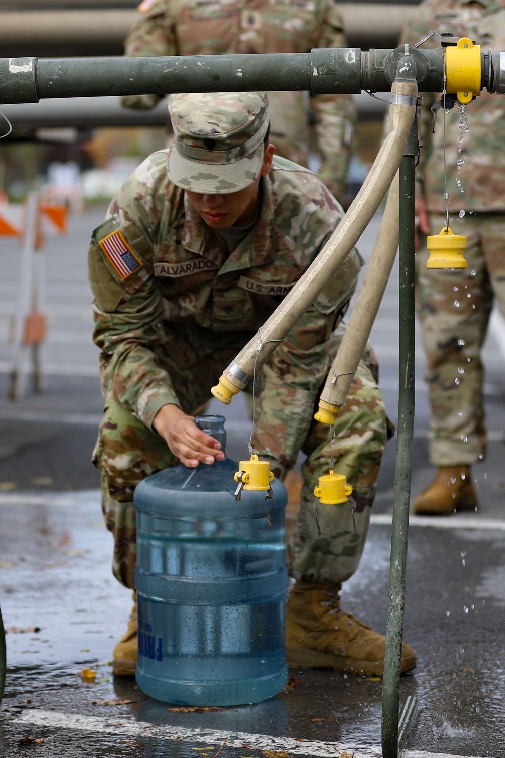 The 10th Mountain Division Sustainment Brigade helps distribute water to residents of Watertown, New York.