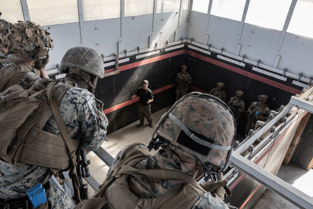 1st Bn., 4th Marines clears buildings during EOTG raid leaders course