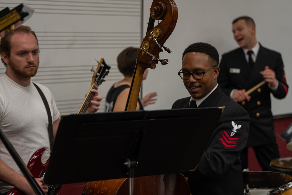 Musician 1st Class William Ledbetter works with Student