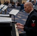 Musician 1st Class Ryan Hanseler performs a piano solo at Spartanburg Highschool