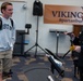 Musician 1st Class Justin Mendez works with students at Spartanburg Highschool