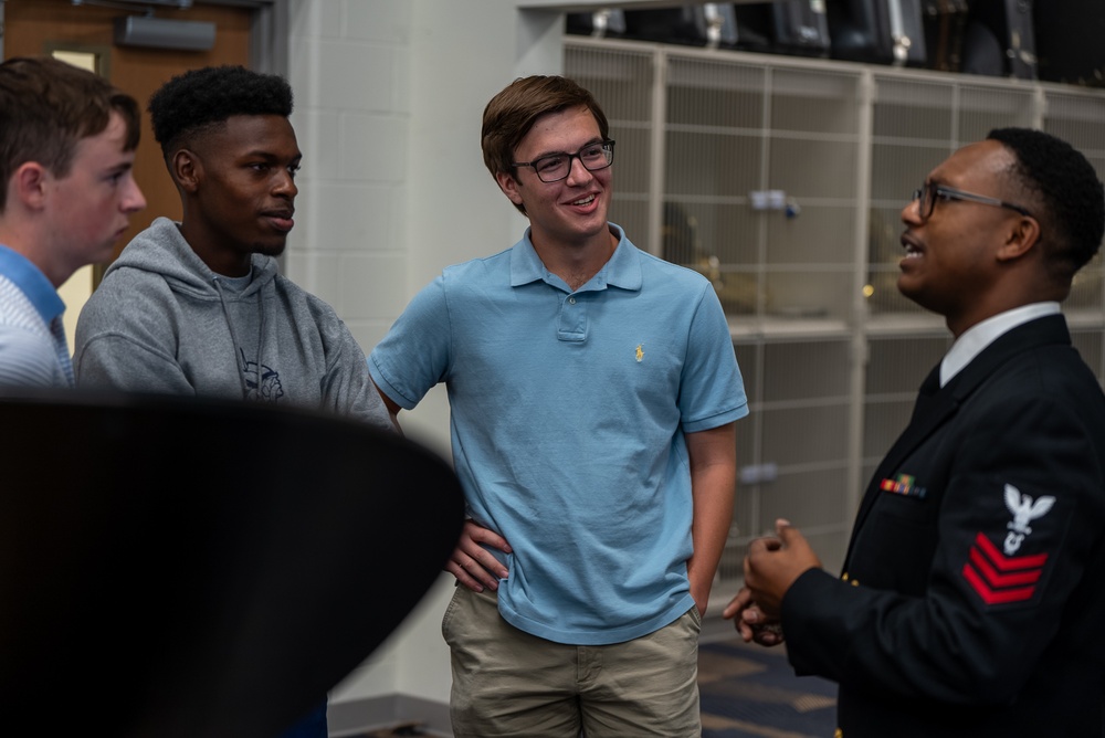 Musician 1st Class William Ledbetter works with students at Spartanburg Highschool